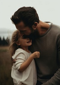 A father and a girl photography portrait kissing. AI generated Image by rawpixel.