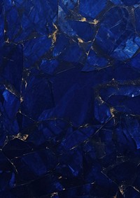 A navy gem-stone wallpaper backgrounds blue flooring. 