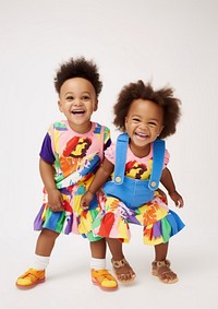 A two little black kids in colorful outfit photography laughing portrait. AI generated Image by rawpixel.