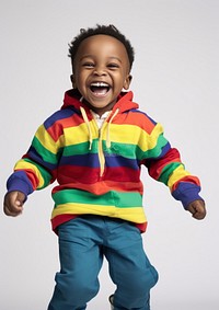 A little black boy in colorful outfit baby photography sweatshirt. AI generated Image by rawpixel.