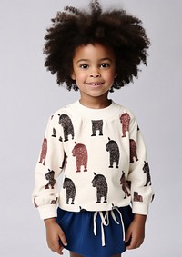 A little black girl wearing alpaca shirt sweatshirt child cute. AI generated Image by rawpixel.
