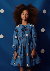 A little black girl wearing cute blue dress with moon pattern fashion hairstyle happiness. AI generated Image by rawpixel.
