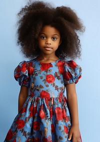 A little black girl wearing cute blue dress with red flowers pattern child kid hairstyle. AI generated Image by rawpixel.