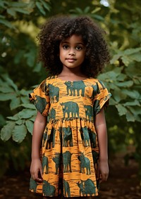 A little black girl wearing tiger pattern dress child cute kid. AI generated Image by rawpixel.