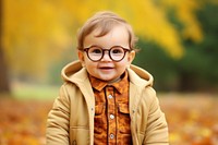 Portrait baby glasses autumn. AI generated Image by rawpixel.