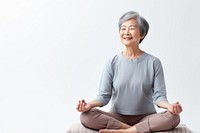 Asian senior woman doing yoga meditation sitting adult contemplation. AI generated Image by rawpixel.