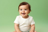 Baby sitting portrait smile photo. AI generated Image by rawpixel.