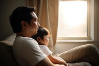 Asian family sitting adult contemplation. AI generated Image by rawpixel.
