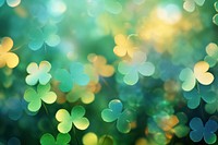 Clover leaf pattern bokeh effect background backgrounds abstract outdoors. AI generated Image by rawpixel.