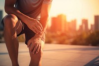 A man is holding his knee adult pain exercising. AI generated Image by rawpixel.