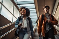 Two young black college students laughing walking stairs. AI generated Image by rawpixel.