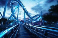 Rollercoaster bridge dusk blue. AI generated Image by rawpixel.