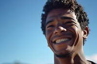 Smiling brazilan man laughs outside laughing adult smile. AI generated Image by rawpixel.