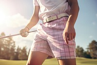 Male golf player sports shorts motion. AI generated Image by rawpixel.