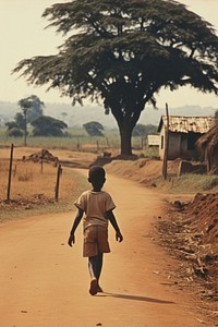 Kid walking countryside outdoors. AI generated Image by rawpixel.