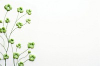 Upper frame border with little lucky clover pattern backgrounds embroidery. AI generated Image by rawpixel.