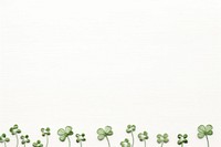Upper frame border with little lucky clover pattern backgrounds green. AI generated Image by rawpixel.