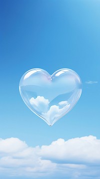 A heart made of glass sky transparent tranquility. AI generated Image by rawpixel.