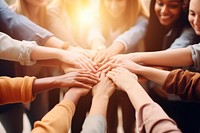 A Team of happy confident smiling young women standing in circle and putting hands together success unity adult. AI generated Image by rawpixel.