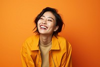 Asian woman cheerful laughing smiling. 