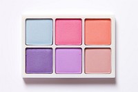 Eyeshadow palette cosmetics white background blackboard. AI generated Image by rawpixel.