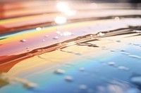Water wit rainbow backgrounds reflection abstract. AI generated Image by rawpixel.