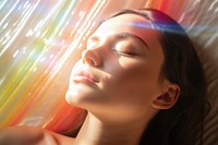 Rainbow ray lay down on woman face portrait adult light. AI generated Image by rawpixel.