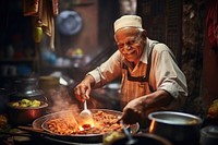 Pakistani elderly cooking south asian food adult street food. AI generated Image by rawpixel.