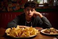 Mexican teenage boy food portrait snack. AI generated Image by rawpixel.