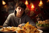 Mexican teenage boy food restaurant portrait. AI generated Image by rawpixel.