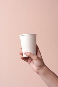 Coffee cup holding coffee hand. AI generated Image by rawpixel.