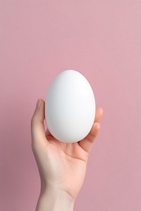 Egg holding hand simplicity. AI generated Image by rawpixel.