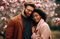 Diversity couple hugging portrait photography blossom. AI generated Image by rawpixel.