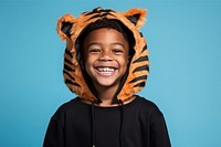 Black young boy smile tiger cute. AI generated Image by rawpixel.