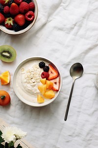 Yogurt bowl spoon dessert fruit. AI generated Image by rawpixel.