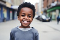 Black little boy smile outdoors portrait. AI generated Image by rawpixel.