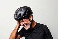 Happy senior man is putting on bicycle helmet portrait adult photo. AI generated Image by rawpixel.