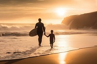 Father and son surfers coast outdoors surfing. 