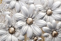 Daisy pattern backgrounds jewelry. AI generated Image by rawpixel.