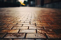 Brown brick pavement eflection cobblestone flooring sidewalk. AI generated Image by rawpixel.