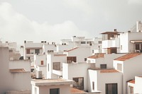 White and brown concrete houses during daytime architecture cityscape building. AI generated Image by rawpixel.