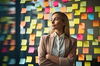 Young businesswoman planning success holding adhesive note adult contemplation creativity. AI generated Image by rawpixel.
