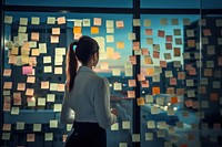 Young businesswoman planning success holding adhesive note adult art contemplation. AI generated Image by rawpixel.