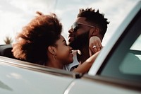 Black Man embracing girlfriend in convertible car travel adult man. AI generated Image by rawpixel.