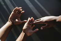 Human hands on surface finger togetherness gesturing. AI generated Image by rawpixel.