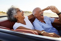 Latinx Older couple laughing in convertible adult togetherness accessories. AI generated Image by rawpixel.