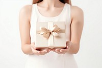 Makeup cosmetics and gift box in hand white background celebration anniversary. AI generated Image by rawpixel.