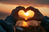 Two hands that are making a heart shape sunset adult silhouette. AI generated Image by rawpixel.
