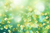 Clover leaf pattern bokeh effect background backgrounds abstract sunlight. AI generated Image by rawpixel.