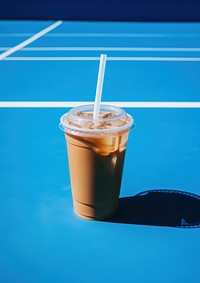 Ice coffee with white sticker on a glass tennis drink blue. AI generated Image by rawpixel.